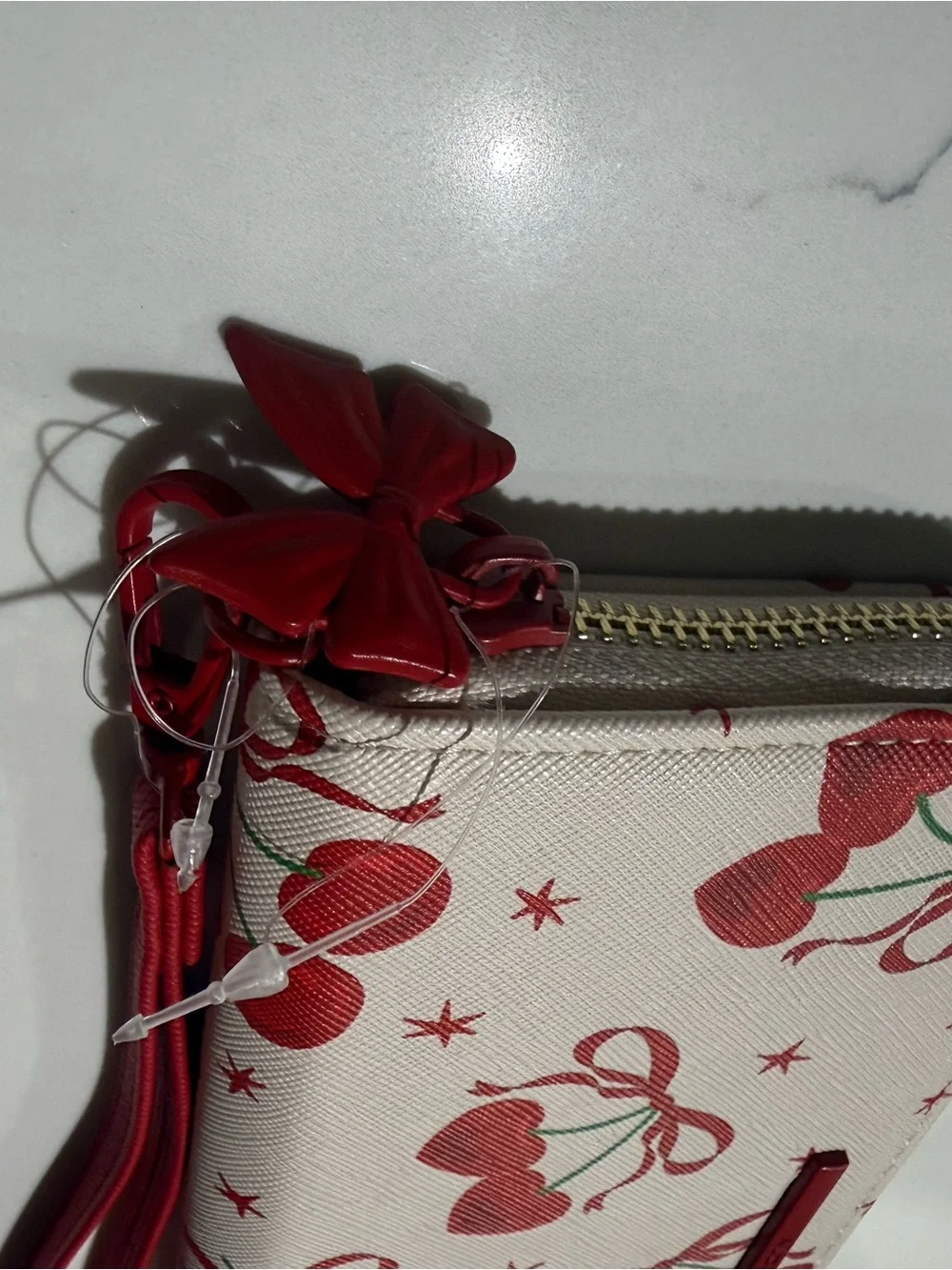 ALDO Cherry Print Zip AroundALDO Cherry Print Zip Around Wallet with Wrist Strap